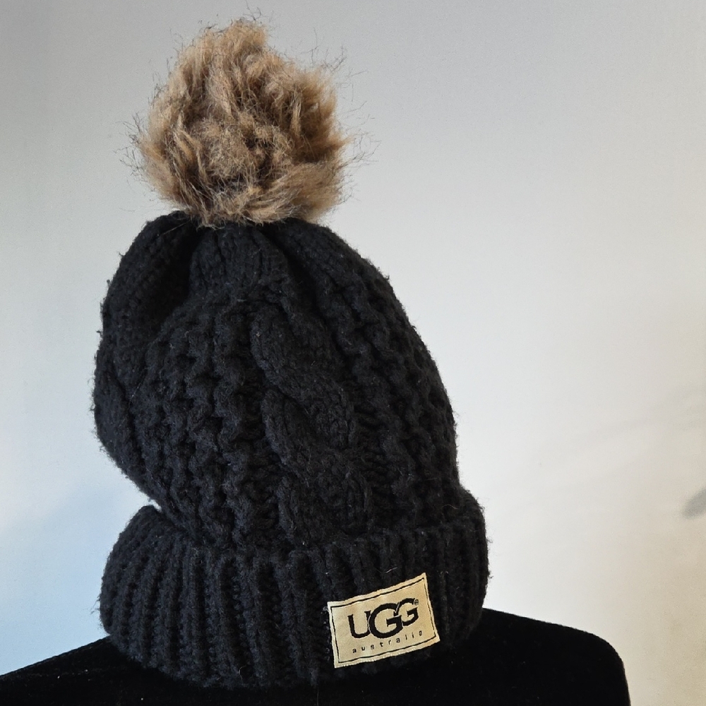 UGG Black Cable Knit Beanie with Tan Pom
